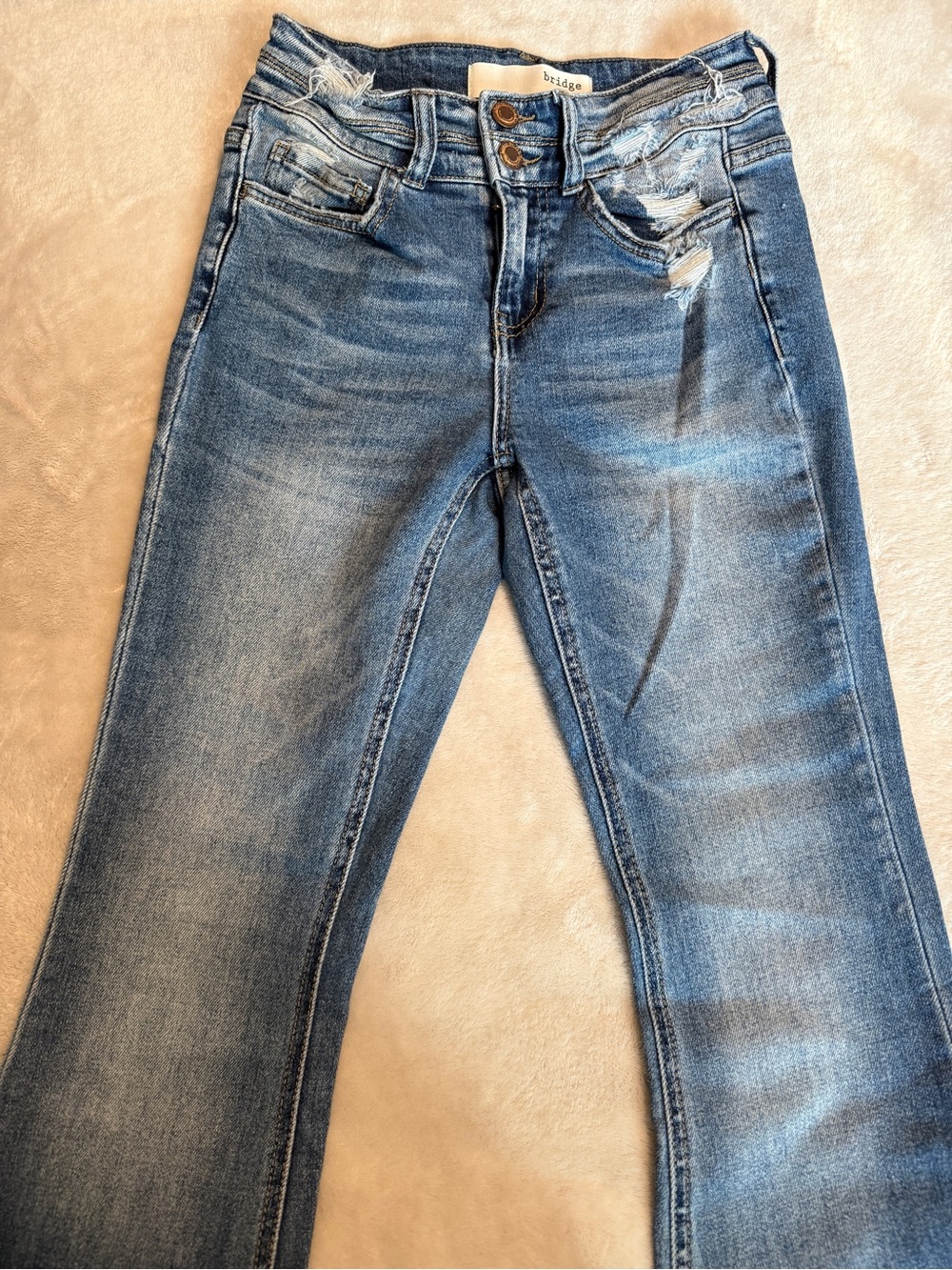 Bridge Distressed Flare Jeans in Blue Wash